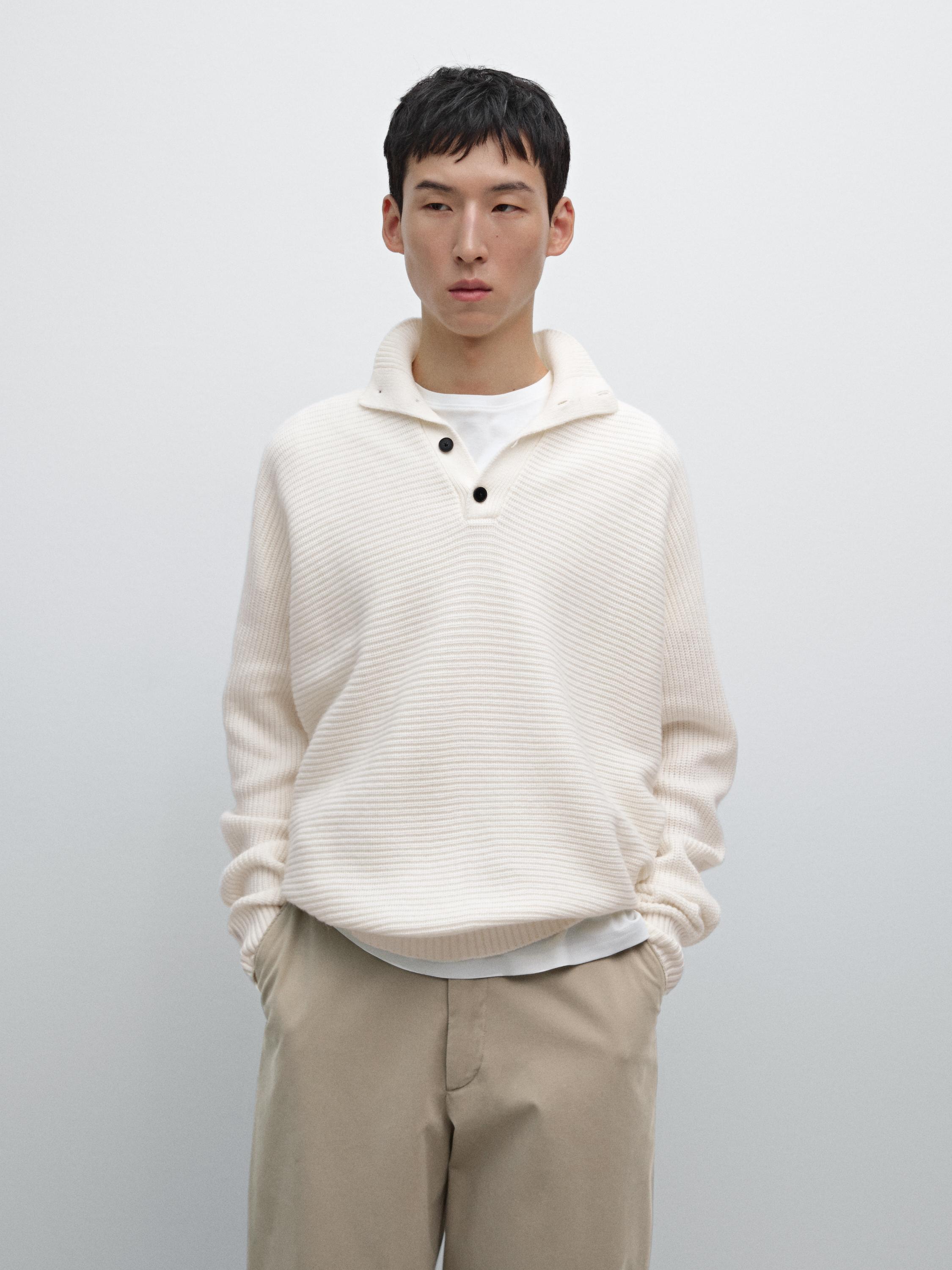 Knit sweater with mock button neck